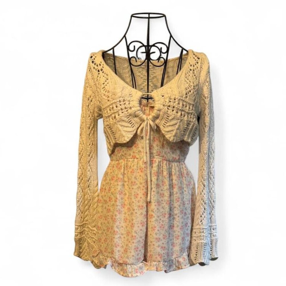 Altar'd State Floral romper with lace up front, ruffle hem and adjustable straps